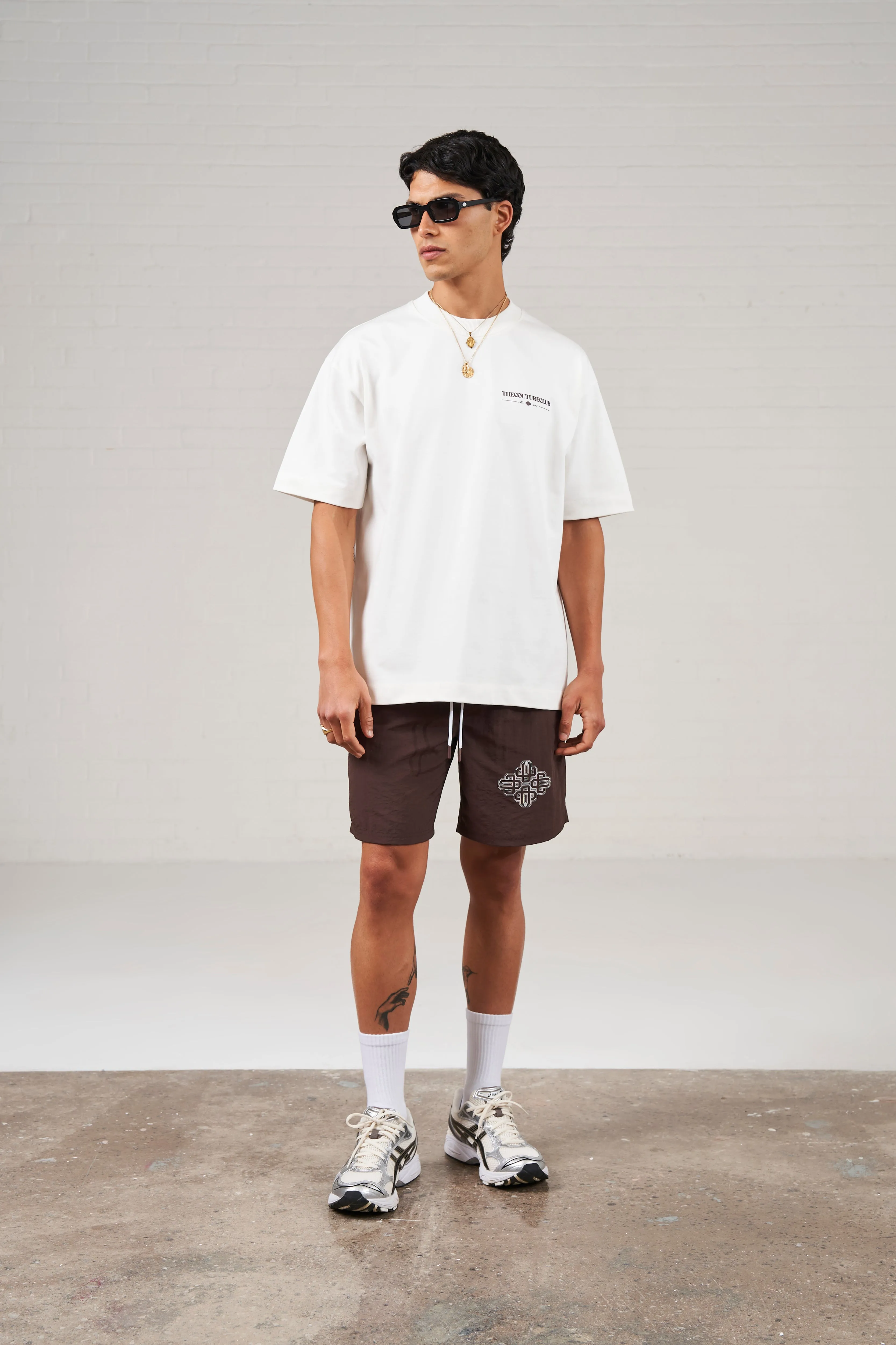 COPYRIGHT EMBLEM MID LENGTH SWIM SHORTS - BROWN