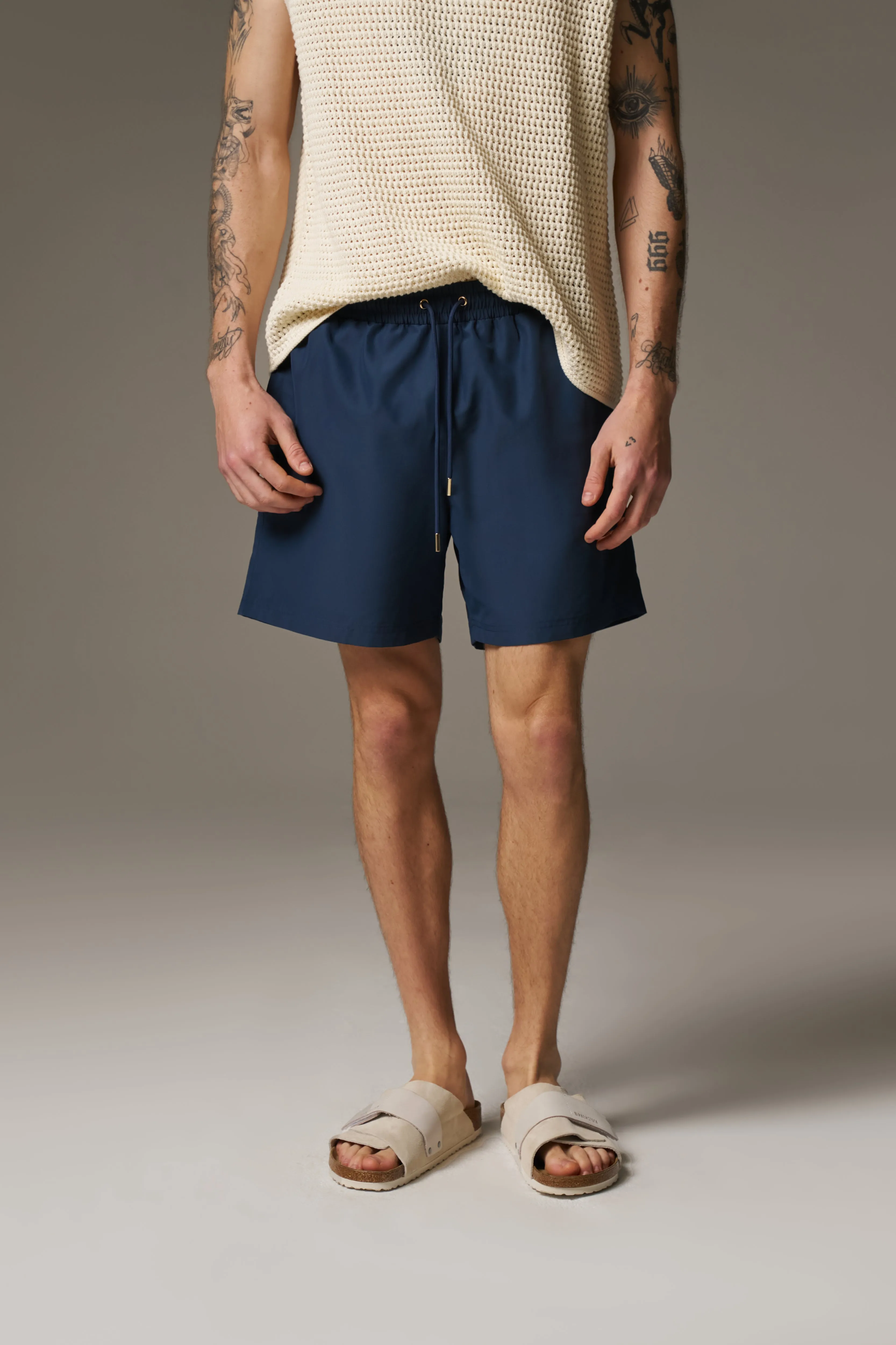 WATER REACTIVE EMBLEM SWIM SHORT - NAVY